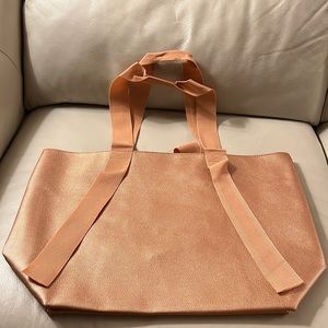 Saks Fifth Avenue bag and a small clutch